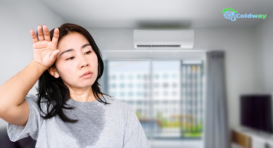 Woman sweating because aircon does not functioning