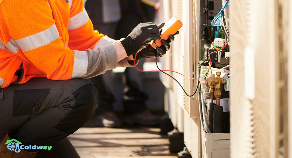 A Technician Troubleshooting An Aircon